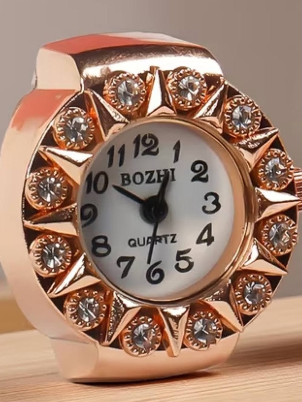 1-Rose Gold Round Face Ring fashion Watch with Crystal Border. 

High-End Style